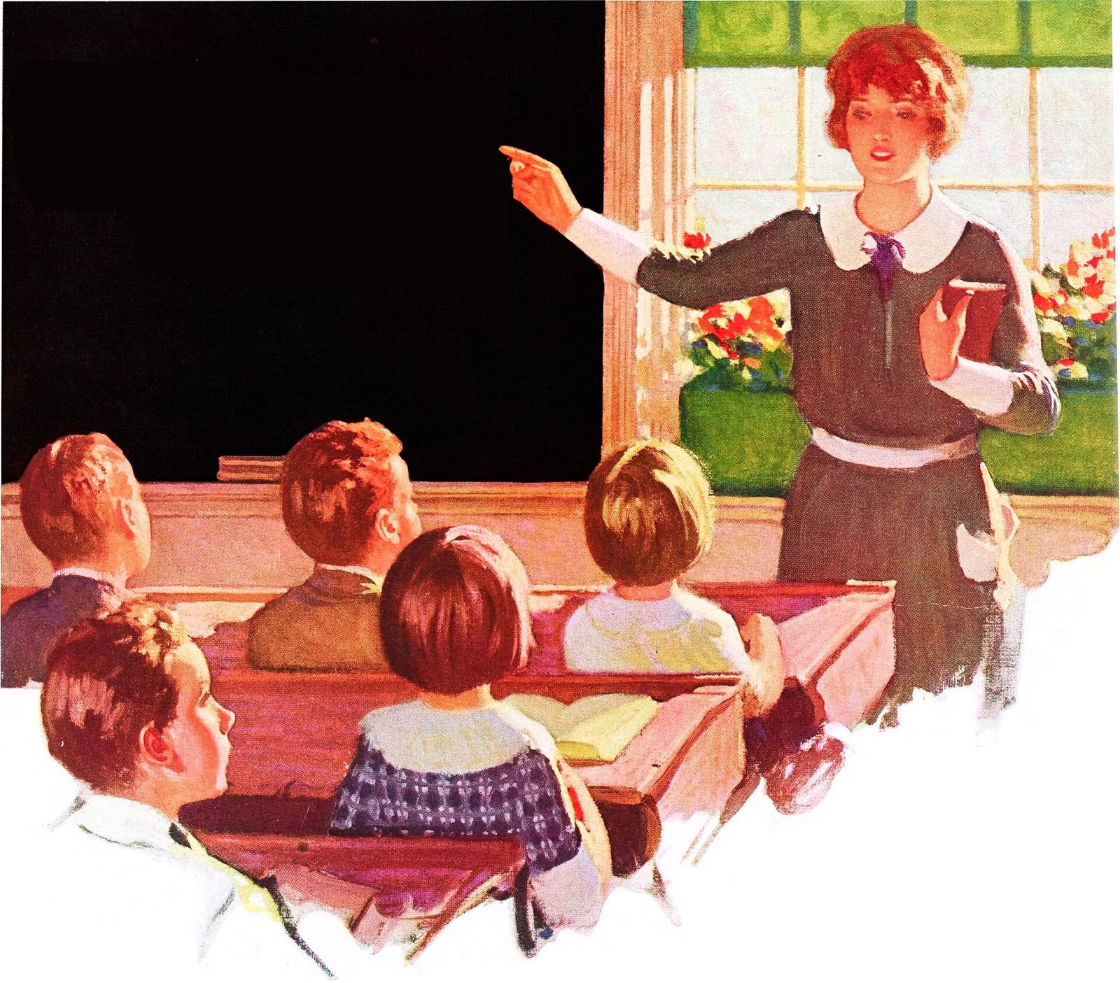 A teacher at the blackboard in a classroom